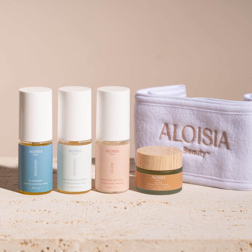 travel sizes of our best selling skincare essentials. NOURISH Oil Cleanser (30 ml), REFRESH Jade Purifying Cleanser (30 ml) GLOW Exfoliating Soft Peel (30 ml),  RESTORE Propolis Collagen Gel (20 ml) and Aloisia Beauty bag. Clean Beauty, K-Beauty,