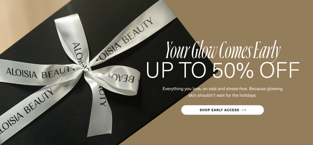 Aloisia Beauty gift box with a silver ribbon on a beige background, featuring our Holiday Sale. Up to 50% OFF Select items