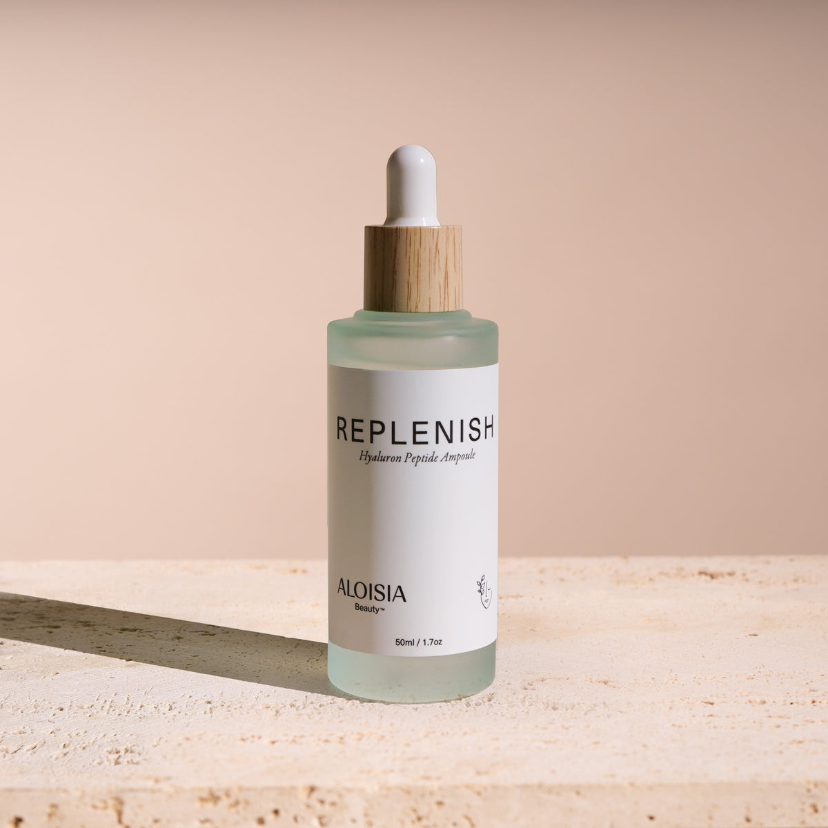 REPLENISH Hyaluron Peptide Ampoule in a frosted glass dropper bottle