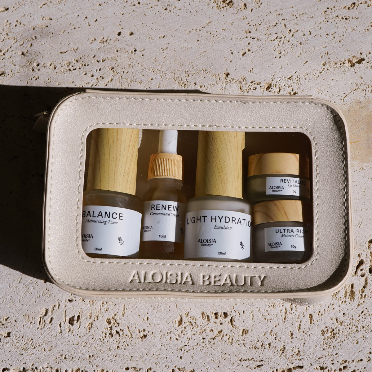 ANTI-AGING & BRIGHTENING MINI Set in a clear travel case