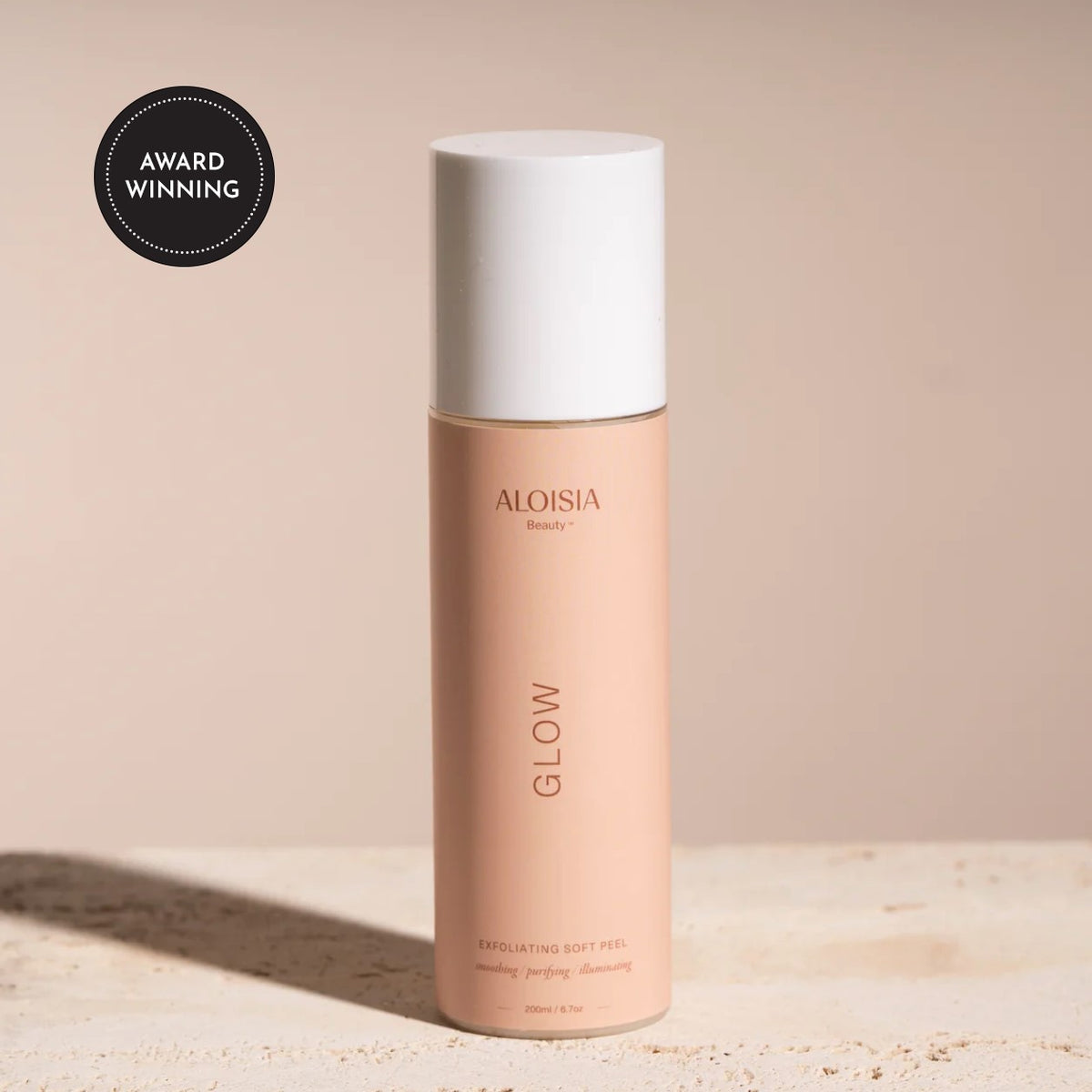 GLOW Exfoliating Soft Peel bottle with an award badge